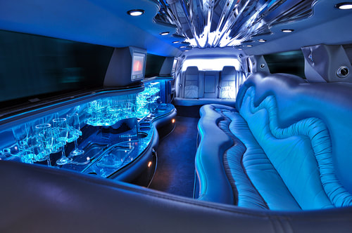 A picture of blue lights inside a limo.